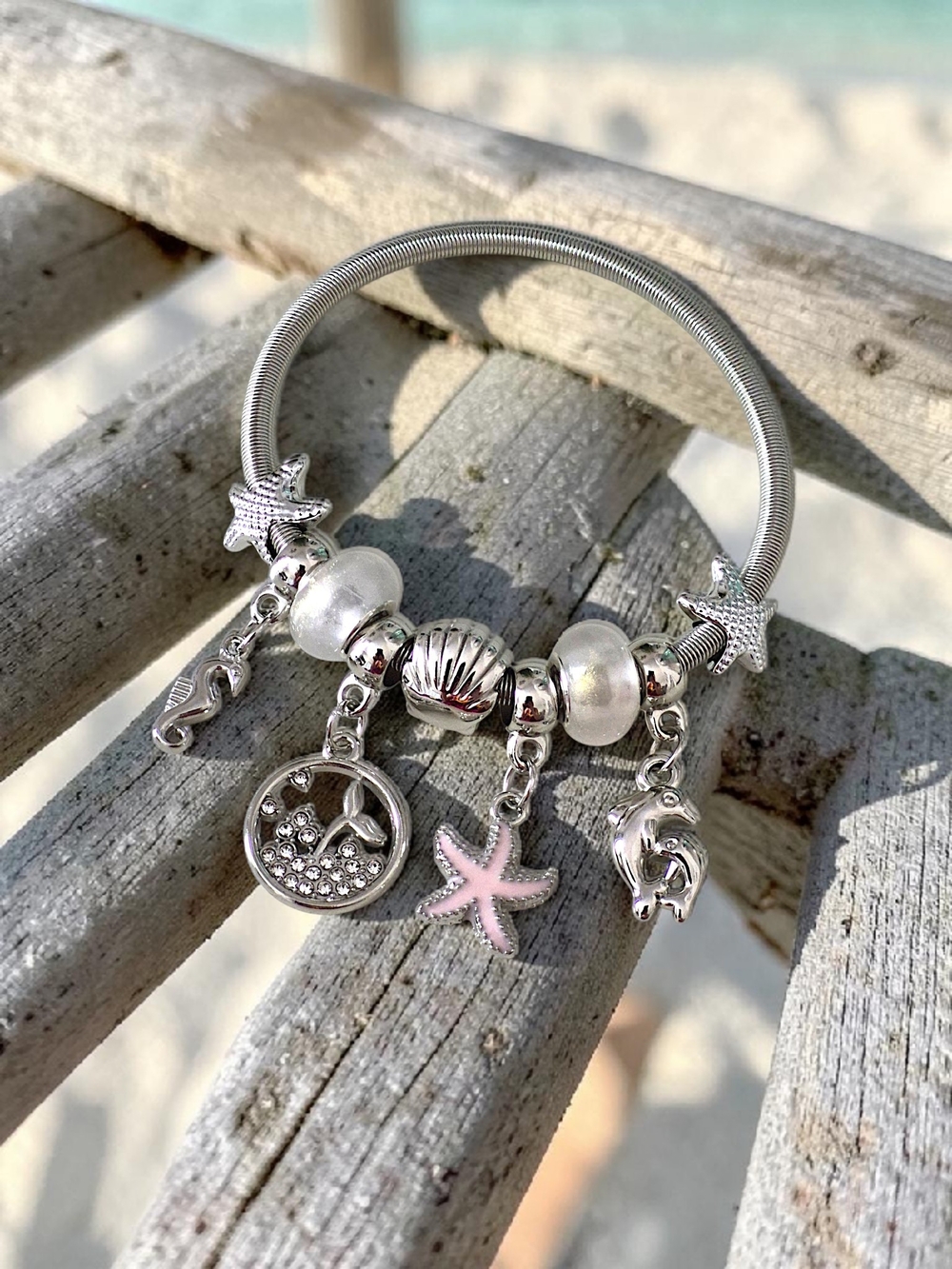 Silver Sea Life Charm Bracelet with Light Pink Starfish